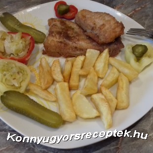 Ropogós  afrikai harca sült burgonyával házi savanyúsággal.